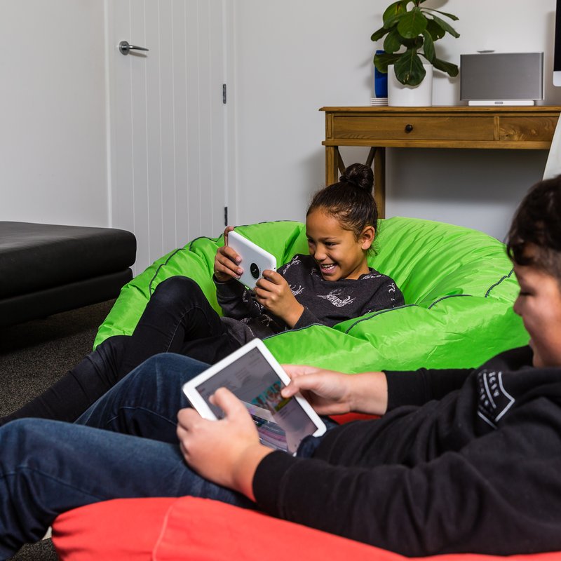 kids on beanbags enjoying wifi